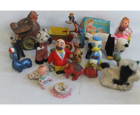 A COLLECTION OF TINPLATE AND PLASTIC CLOCKWORK TOYS, to include Marx "Goofy The Gardener", T. H. Balloon Vendor, boxed Kantos