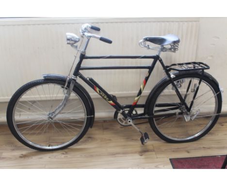 A HERO CYCLES BIKE, with vintage hide saddle and a miler head lamp