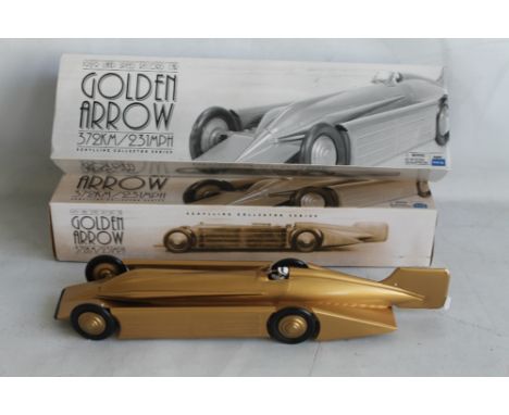 A SCHYLLING COLLECTOR SERIES "1929 GOLDEN ARROW" TINPLATE CLOCKWORK LAND SPEED RECORD CAR, in illustrated box with inner pack