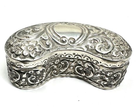Antique silver bowed trinket box measures approx 8cm by 3cm 