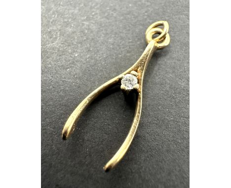 Vintage 9ct gold wishbone charm weight .8 g 