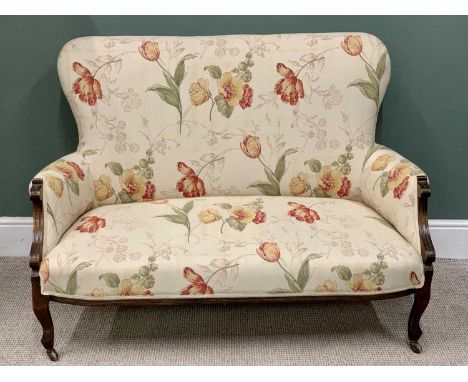 EDWARDIAN RE-UPHOLSTERED TWO SEATER COUCH, light beige with large colourful floral detail, shaped to the front of the arms an