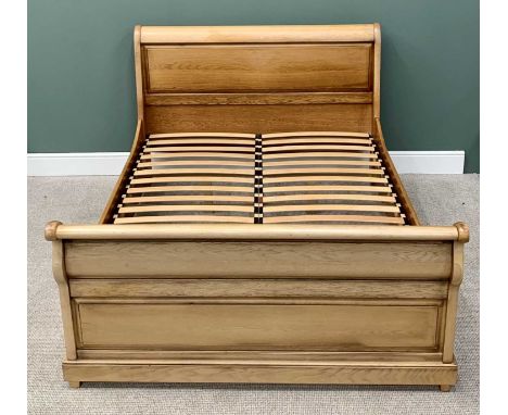 MODERN LIGHT OAK SLEIGH-TYPE BED TO TAKE A KING SIZE MATTRESS, 110cms max. H, 165cms W, 222cms overall L