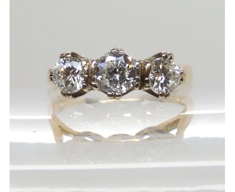 AN 18CT YELLOW GOLD THREE STONE DIAMOND RING set with estimated approx 0.90cts of diamonds in total, finger size M1/2, weight