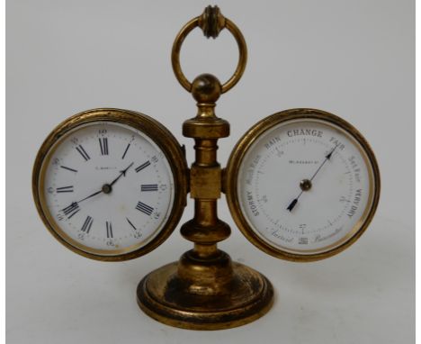 A 19TH CENTURY TRAVELLING CLOCK/BAROMETER AND THERMOMETER with titling faces mounted in a gilded stand with carrying handle, 