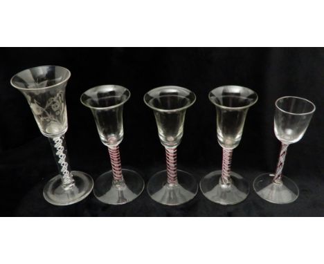 A GROUP OF FIVE WINE GLASSES comprising three continental coloured twist examples, possibly Dutch 15cm high; another coloured