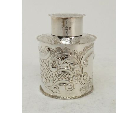 AN EDWARDIAN SILVER TEA CADDY by Elkington &amp; Co., Birmingham 1904, of cylindrical form with removable cap and foliate emb