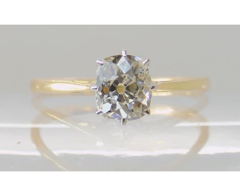 AN 18CT GOLD AND PLATINUM OLD CUSHION CUT DIAMOND RING the diamond is estimated approx 0.65cts, finger size N1/2, weight 1.6g