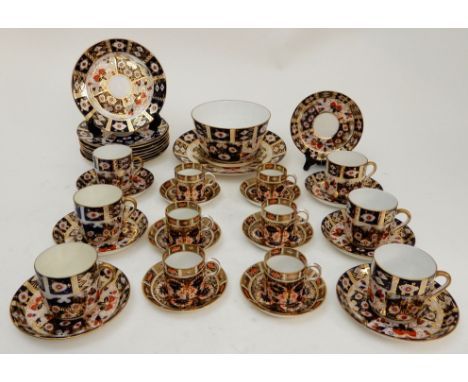 SIX ROYAL CROWN DERBY DEMITASSE CUPS AND SAUCERS pattern 1128, assorted dates, together with six Derby cups, eight saucers, n