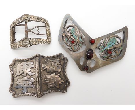 THREE VINTAGE BUCKLES A Chinese white metal example with Chinese symbols, dimensions 8.5cm x 5.9cm, weight 39.5gms A Georgian
