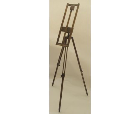 AN OAK FOLDING TRAVEL EASEL with tripod base Estate of Alasdair Gray Condition Report: Available upon request
