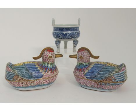 A PAIR OF CANTON ENAMEL MANDARIN DUCK TUREENS each painted with bright colours and with brass mounted combs,16.5cm long and a