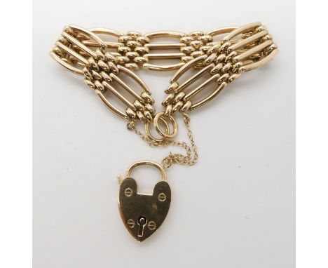 A 9CT GOLD FANCY GATE BRACELET WITH HEART SHAPED CLASP length 17cm, weight 24.3gms Condition Report: In good condition.