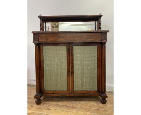 A Regency rosewood chiffonier, the open shelf with three quarter gallery standing on a mirror back and turned supports, above