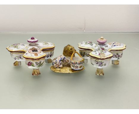 A pair of Strasbourg faience tri-form salts by Paul Hannong, each cover with one armorial panel, the other two with floral sp