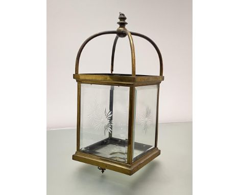 A late 19th/early 20th century gilt-brass and cut-glass hall lantern, the oblong frame with four star-cut glass panels. 64cm 