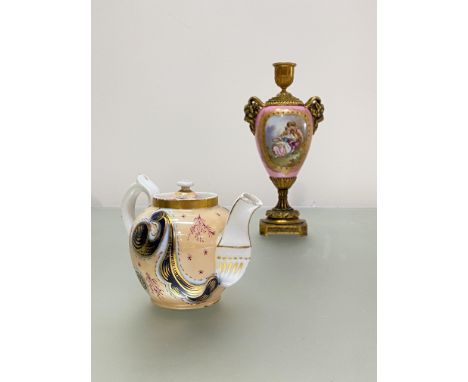 A small Russian porcelain teapot, Kuznetsov, late 19th century, of bullet form, decorated with cobalt blue and gilt swirls ag