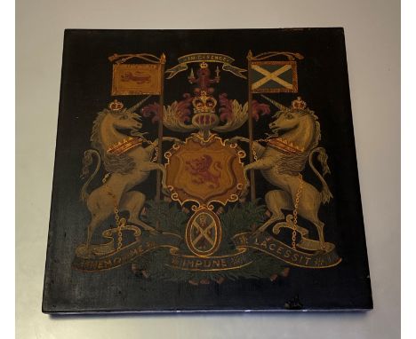 A painted armorial panel: the Royal Coat of Arms of Scotland, with the Garter motto, polychrome on a wooden panel, inscribed 