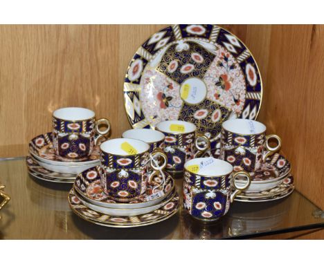 A ROYAL CROWN DERBY PART COFFEE SERVICE, in the Imari pattern, marked 2614, comprising a plate, diameter 23cm, six cups, six 