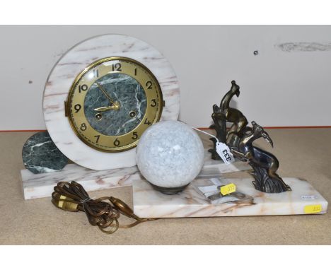 AN ART DECO CIRCULAR CLOCK AND A GLOBE LAMP WITH A DEER comprising an art deco marble clock of a circular form mounted on a p