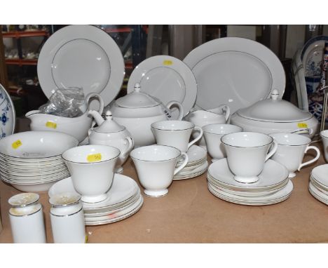 A GROUP OF WEDGWOOD 'SIGNET PLATINUM' DINNER WARES comprising a teapot, eight teacups, eight saucers, eight side plates, a mi