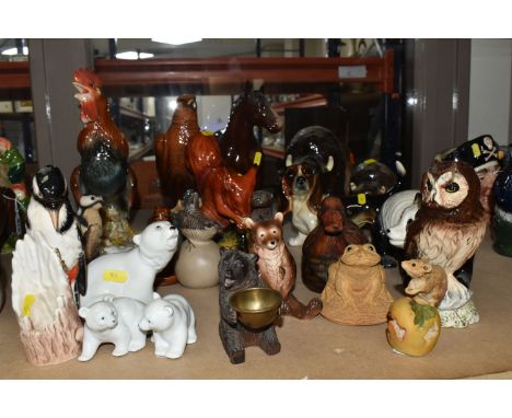 A COLLECTION OF ORNAMENTAL ANIMALS,  to include a black forest bear holding a small brass bowl, vintage ceramic brown bear ma