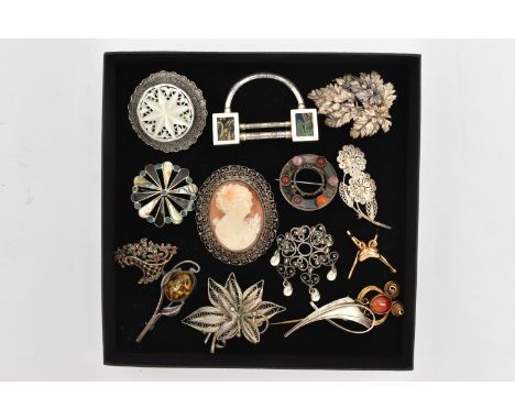 AN ASSORTMENT OF SILVER AND WHITE METAL BROOCHES, to include an AF Scottish brooch, hallmarked Birmingham, an AF insect brooc