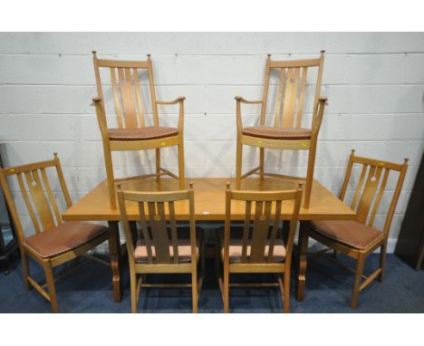 A RECTANGULAR OAK DINING TABLE, raised on shaped legs, united by a block stretcher, length 183cm x depth 77cm x height 76cm, 