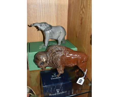 A BOXED BESWICK ELEPHANT AND A BESWICK BISON FIGURE, comprising Elephant - Trunk Stretching - Small, model no 974, and Bison,