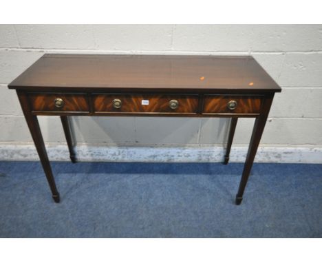 A BEVAN FUNNELL REPRODUX MAHOGANY SIDE TABLE, with three frieze drawers, raised on square tapered legs, with spade feet, widt