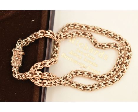 A 9CT GOLD FANCY LINK CHAIN, circular links with applied bead work detail, fitted with an integrated push piece barrel clasp 