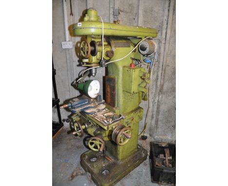 A VINTAGE HERBERT No.0V MILLING MACHINE converted to 240volt operation, approximate height 160cm x approximate depth 90cm and