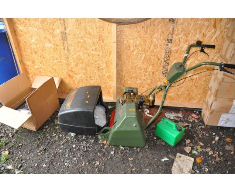 A WEBB 14 PETROL CYLINDER MOWER with collection box and a Garden Gear manual lawn mower (appears to be new in box)(Webb doesn