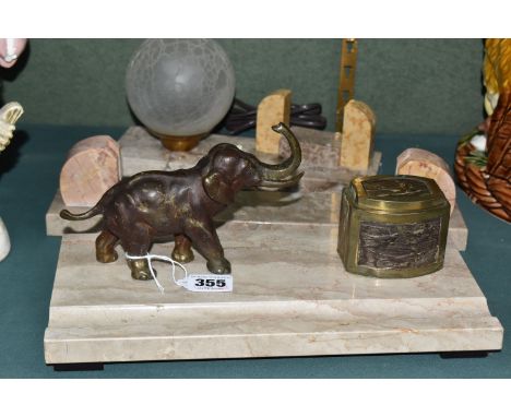 AN ART DECO INKSTAND, LAMP AND PHOTOGRAPH FRAME, the inkstand with single bronzed hinged inkwell, cast with a pattern of swal