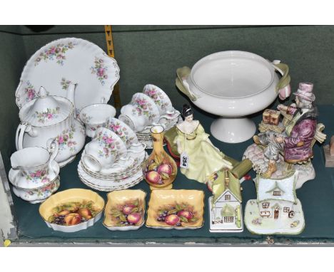 A GROUP OF CERAMICS, to include a Royal Doulton 'At Ease' HN2473 figurine, a twenty one piece Royal Albert Moss Rose tea set,