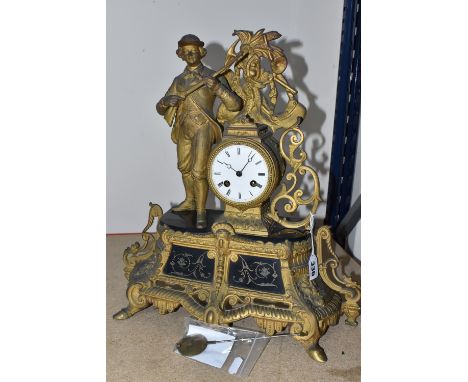A FRENCH ORUMLU CLOCK with a figurative structure of a hunter, an enamelled face with Roman numerals, without a glass bevel, 