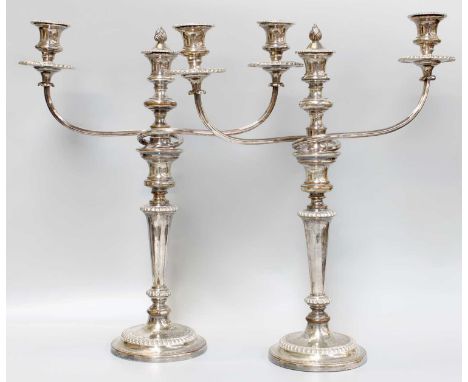 A Pair of Old Sheffield Plate Three-Light Candleabra, Apparently Unmarked, First Half 19th Century, on circular base with gad