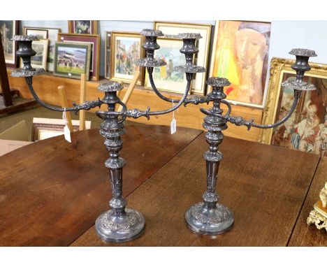 A Pair of Silver Plate Three-Light Candelabra, Apparently Unmarked, Probably First Half 19th Century, the bases each circular