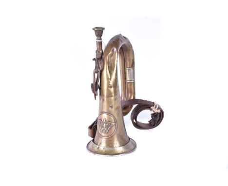 A WWI Prussian military-issue mixed-metal bugle, by Alexander Mainz, dated 1914, in combat condition, with Prussian Eagle emb