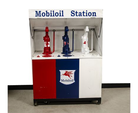 A Shell-Mex and BP Ltd Mobiloil Station, bearing three pumps in red blue and white, bearing red Pegasus transfers, each pump 