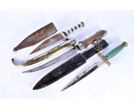 A Pakistan Renaissance dagger, with sheath, together with an Egyptian dagger, plus another Middle Eastern dagger (3) 