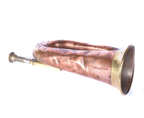 A WWI military issue copper and brass bugle, by Boosey &amp; Co, dated 1916, marked with broad arrow, in seen war condition 