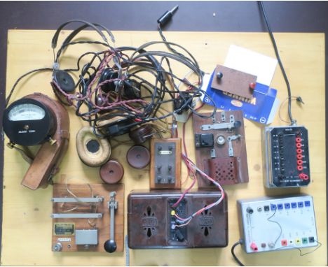 Battery eliminator and other items, an Ekco Power Unit, two other battery eliminators, three pairs of headphones, two practic