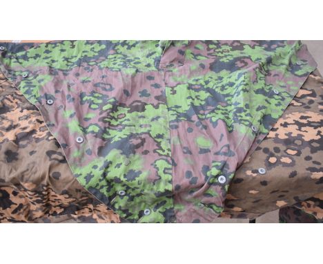 A selection of German items, to include an SS Dot Camo Smock, a German Army Smock, an SS43 cap, pus plain example, SS Dot Cam