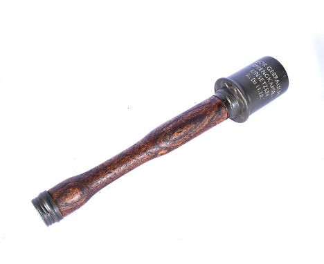 A WWII German Third Reich inert Stick Grenade, with Third Reich stamp to the top, with serial RR564 1939, dated 1939, with or