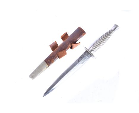 A Nickel Fairbairn Sykes dagger by Wilkinson, with manufacturer etched to the lower part of the blade, with ribbed grip, comp