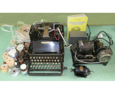 Teleprinting, a Morkrum-Kleinschmidt Perforator with typewriter pattern keyboad and a roll of tape; a small General Electric 