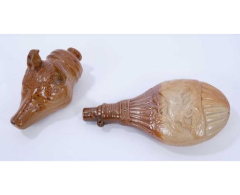 Salt glazed pottery stirrup flask in the form of a fox's head, c.1850, 14cm long, and a further stirrup flask decorated in re