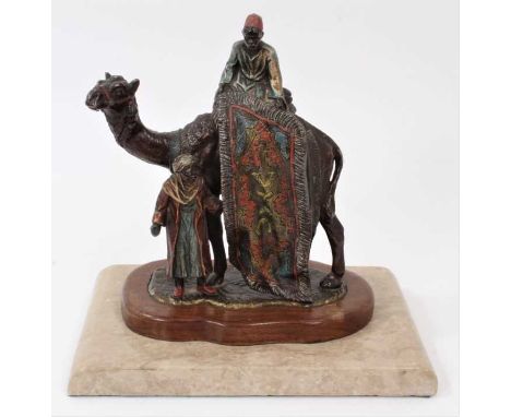 After Franz Bergman - cold painted metal model of carpet sellers, raised on shaped wooden base and rectangular marble plinth,