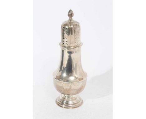 Edwardian silver sugar caster of baluster form with pierced slip in cover, on circular pedestal foot, (Sheffield 1908), maker